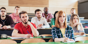 International students attentively listening in a classroom at a university in Istanbul.