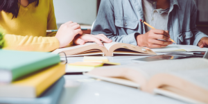 Students preparing documents and studying for YÖK equivalency procedures in Turkey.