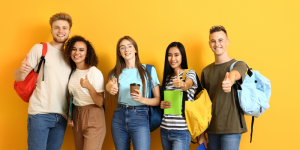 Group of international students smiling and giving thumbs up after completing the YÖK degree equivalency process.